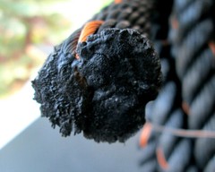 1″ Polypropylene Rope 75′ length 3 Strand Twisted Black with Orange Tracer