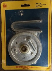 DOOR PRODUCTS, Inc. GARAGE DOOR 4″ PULLEY W/ HOOK & BOLT, #210 New & Sealed