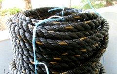 5/8″ Polypropylene Rope 150′ length 3 Strand Twisted Black with Orange Tracer