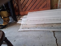 Vinyl Siding In Full Length Pieces. A Few Are Damaged.